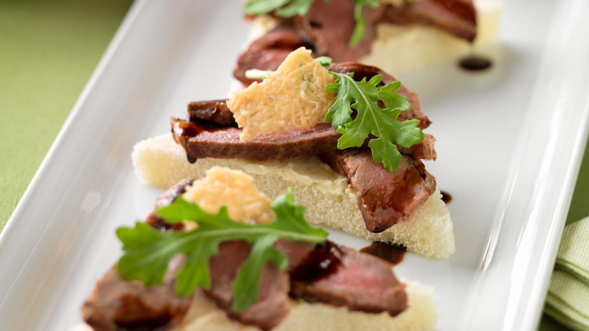 Beef Crostini with Parmesan Crisps and Balsamic Drizzle