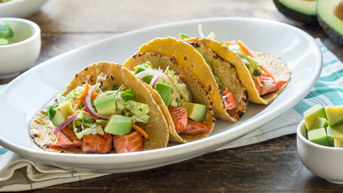 Grilled Salmon Tacos with Avocado Cabbage Carrot Slaw