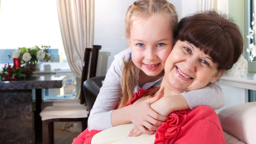 Woman and girl smiling