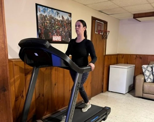 Real Women Class 2023 Margarita Pineiro walking on a treadmill
