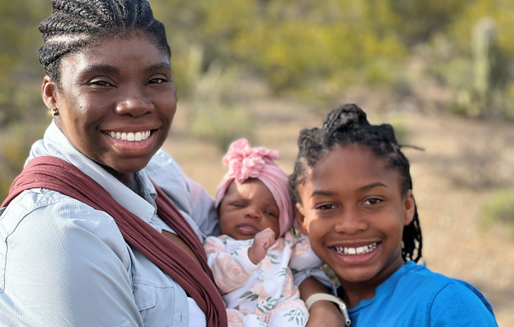 Real Women Class 2023 Naomi and her two children.