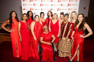 The 2024 Go Red for Women Class of Survivors at the Red Dress Collection Concert.
