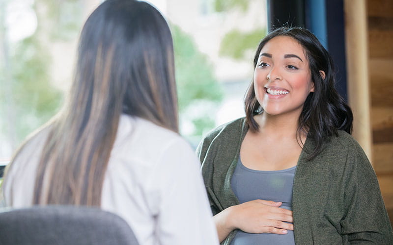 Pregnant woman at a checkup with her doctor