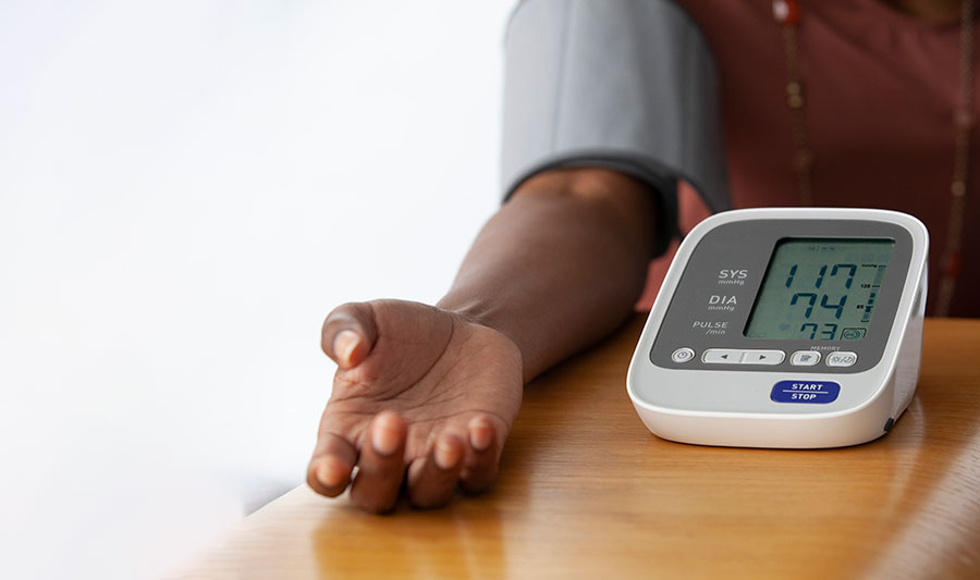 woman arm measuring blood pressure