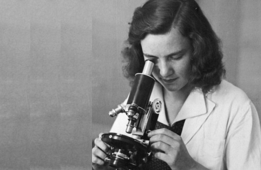 Woman scientist with microscope