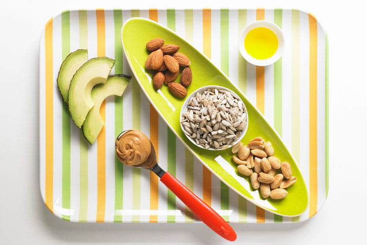 A plate showing foods that contain monounsaturated fats.
