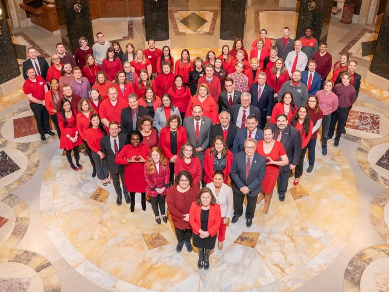 Advocates from the AHA join Wisconsin Lt. Gov. Sara Rodriguez (front), legislators and others at the State Capitol to kick off American Heart Month this year. The advocates were in Madison on Jan. 30 to talk with legislators about important policy priorities, including extending Medicaid postpartum coverage, nutrition incentive programs and youth tobacco use. (Photo courtesy of Wisconsin State Senate)