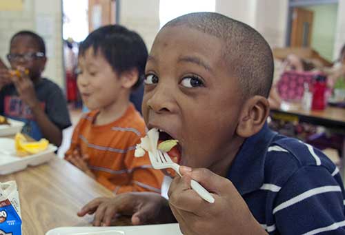 kids eating in cafeteria