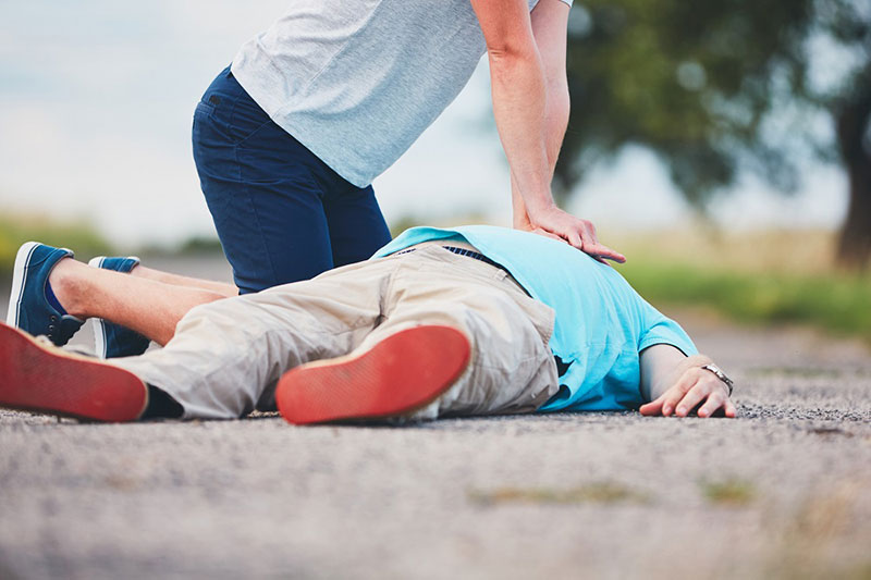 man giving CPR