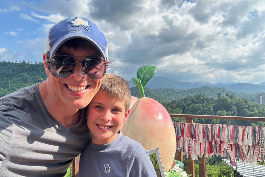 Chris posing with his son Carter