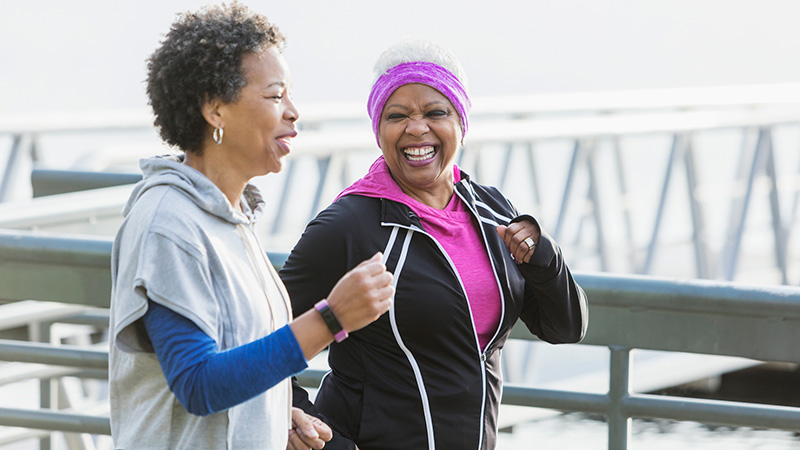 adult women exercising outdoors