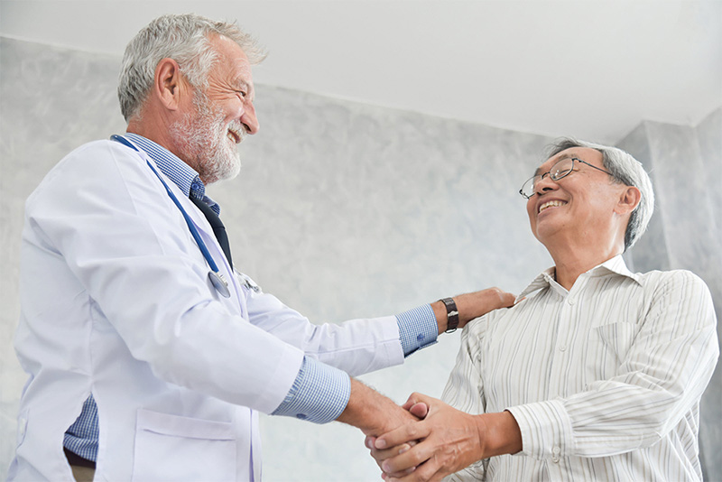 doctor shaking patient hand