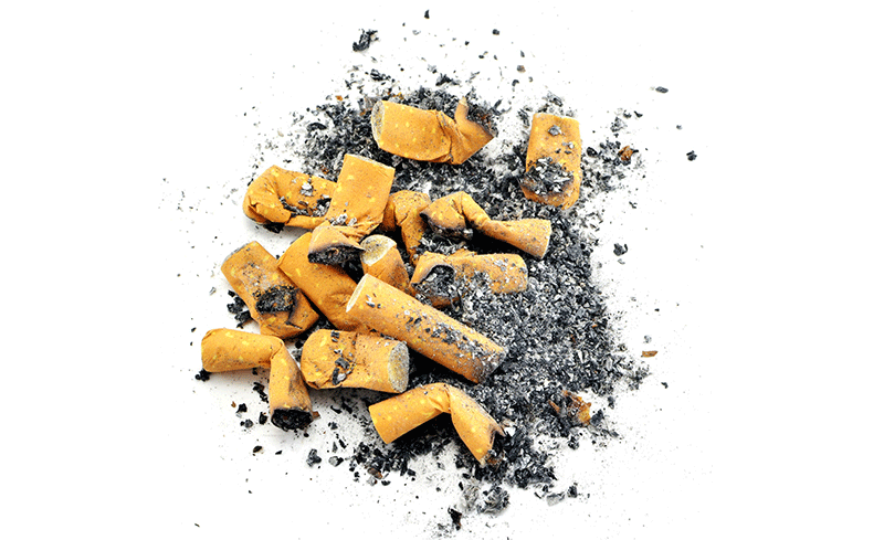 Pile of cigarette ends and ash