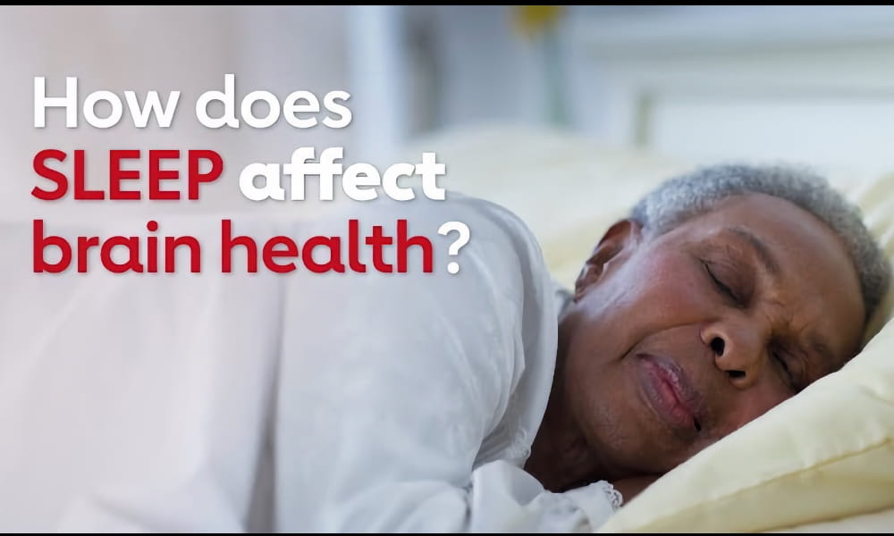 woman sleeping in bed with text overlay: How does sleep affect brain health?