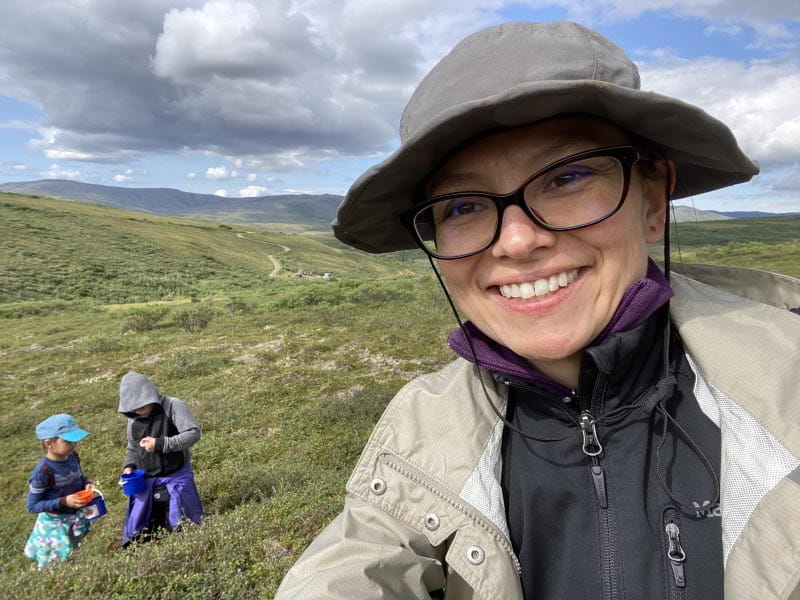 Dr. Allison Kelliher (foreground) picking berries on a tundra outside of Nome, Alaska, with her niece Kyra Kelliher and nephew Hanley Kelliher. (Photo courtesy of Dr. Allison Kelliher)