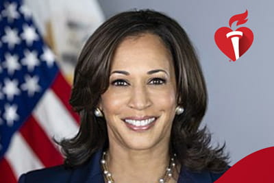 a portrait of Kamala Harris with the United States flag in the background
