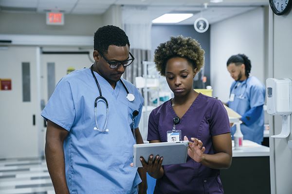 Doctor and Nurse Talking