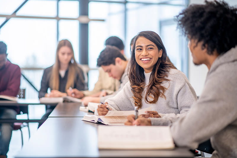 multicultural college students in class