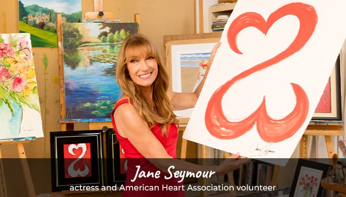 Jane Seymour holding up Heart design