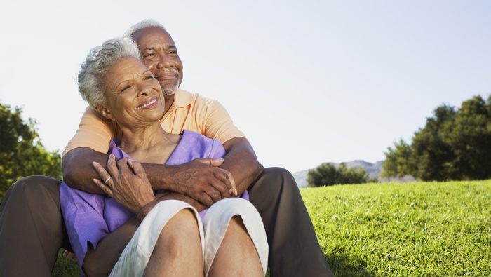 older couple sitting outside