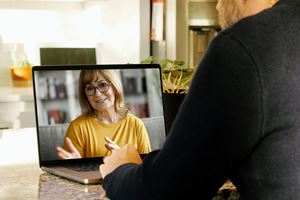 Man and woman video calling