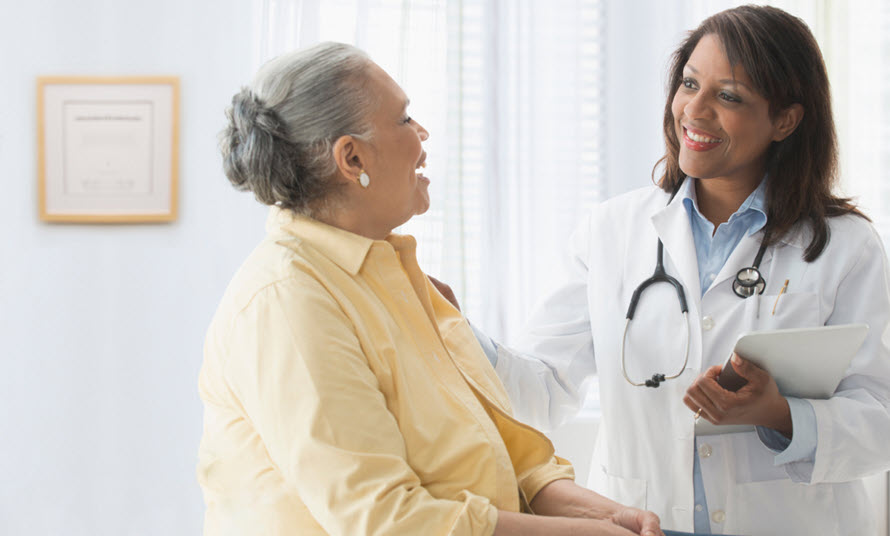 Smiling patient and doctor