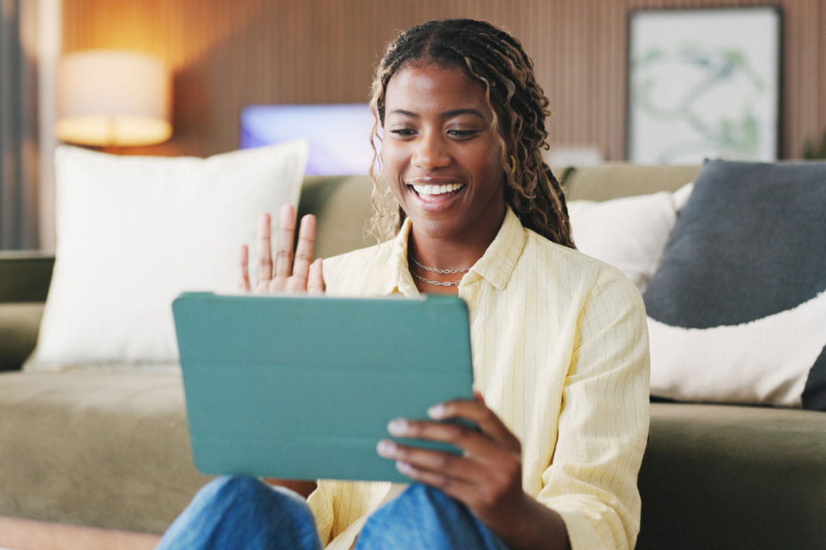 Woman having conversation on her tablet